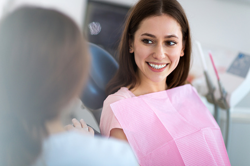 Dental patient looking at dentist